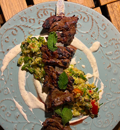 Shukette signature dishes Not Your Average Hummus
Joojeh Chicken
Grass-Fed Steak Shish Kebab